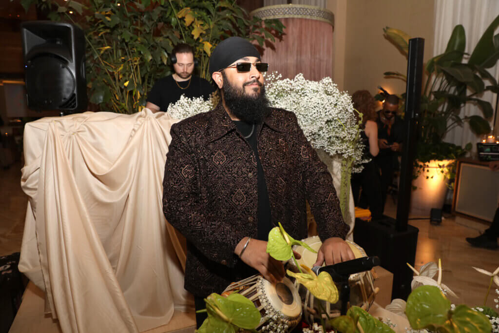 MIAMI, FLORIDA - DECEMBER 03: A musician performs during "Art From The Eye of India" hosted by Nina Magon, Rupi Kaur, and Masaba Gupta at Miami Art Week at The Shelborne by Proper on December 03, 2025 in Miami, Florida.  (Photo by Aaron Davidson/Getty Images for Nina Magon Studio)