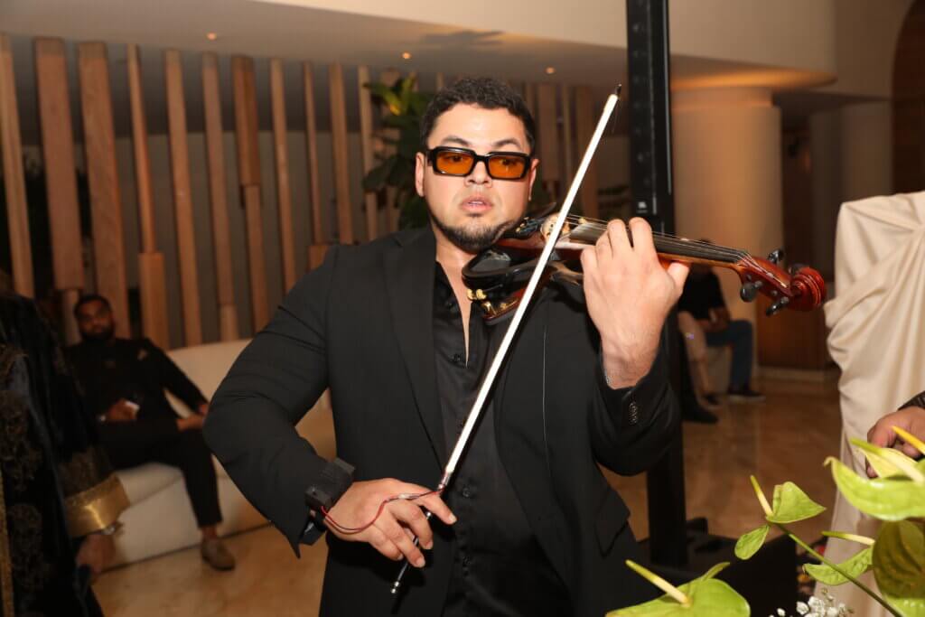 MIAMI, FLORIDA - DECEMBER 03: A musician performs during "Art From The Eye of India" hosted by Nina Magon, Rupi Kaur, and Masaba Gupta at Miami Art Week at The Shelborne by Proper on December 03, 2025 in Miami, Florida.  (Photo by Aaron Davidson/Getty Images for Nina Magon Studio)