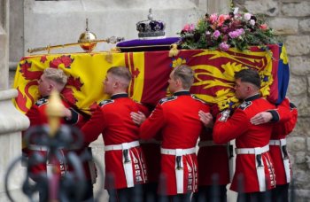 Queen Elizabeth II Is Laid To Rest With State Funeral: Gun carriage with The Queen en route to Westminster Abbey. Photo Credit: Screenshot of CBC broadcast