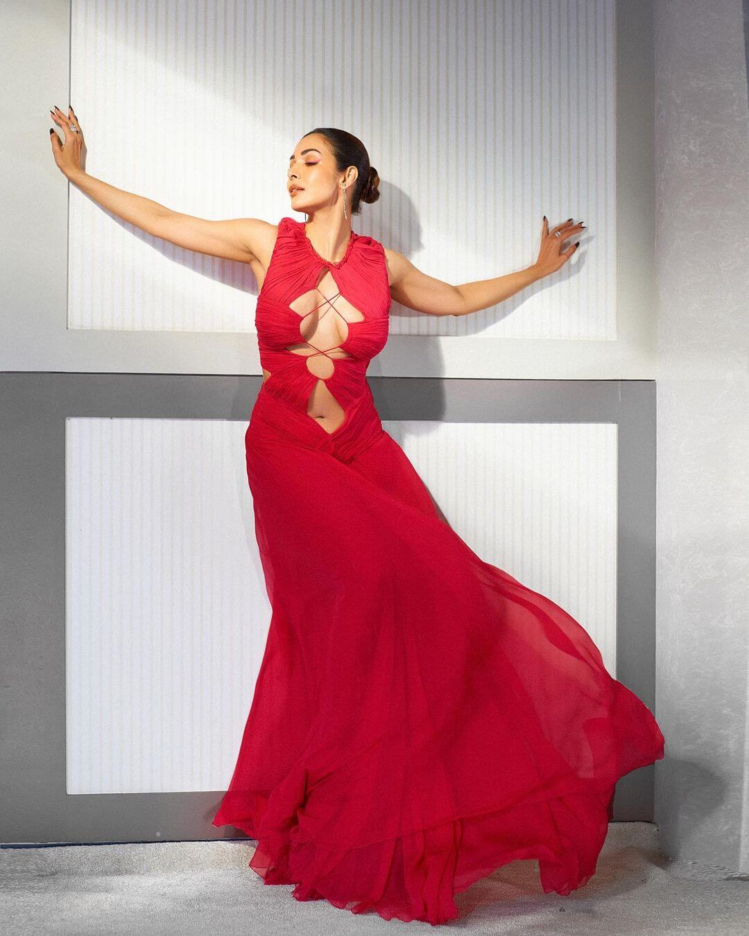 Actress Malaika Arora in a red out cut-out dress. Picture: www.instagram.com