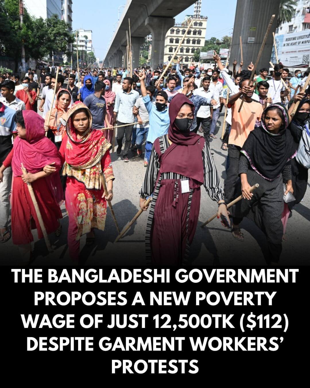 Bangladeshi Garment Workers Clash With Police Over Wage Protest