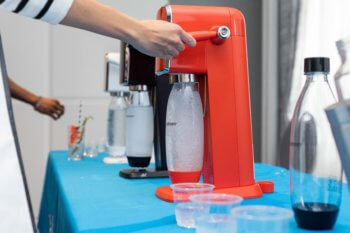 <strong>TIFF 2022: Checking Out The Fabulous Bask-It-Style Gift Lounge: SodaStream's latest collection of carbonators. Love their latest gorgeous Mandarin coloured one!</strong> Photo Credit: Hina P. Ansari 