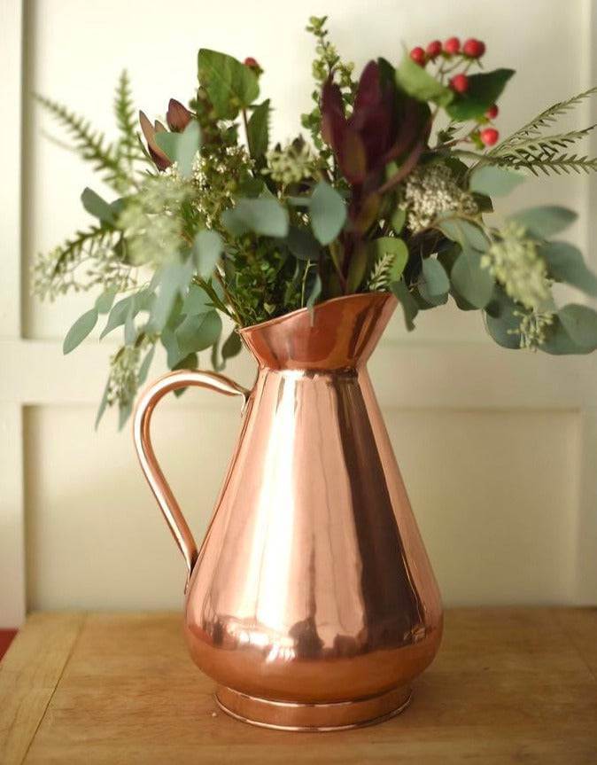 Jali, Jazz, and Cozy Corners: Your South Asian Fall Refresh - Copper Pitchers As Vases. 