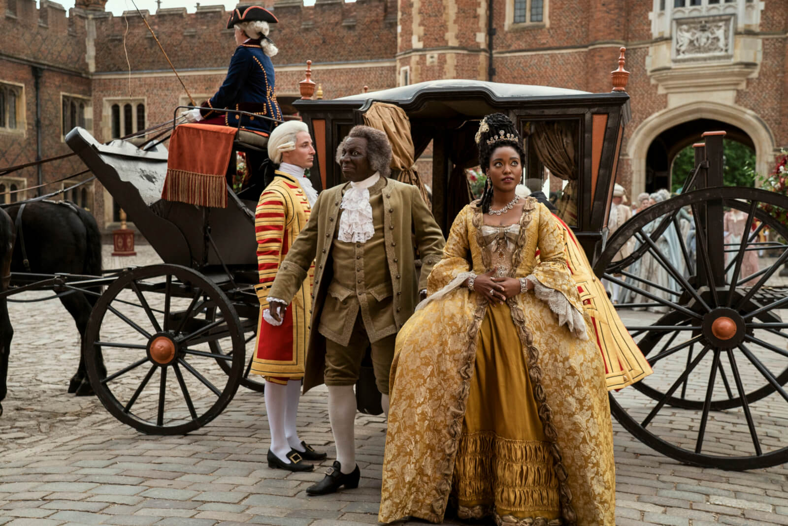 Queen Charlotte: A Bridgerton Story. (L to R) Cyril Nri as Lord Danbury, Arsema Thomas as Young Agatha Danbury in episode 101 of Queen Charlotte: A Bridgerton Story. Cr. Liam Daniel/Netflix © 2023