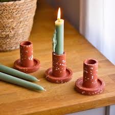 Jali, Jazz, and Cozy Corners: Your South Asian Fall Refresh - Teracotta Candle Holders. 