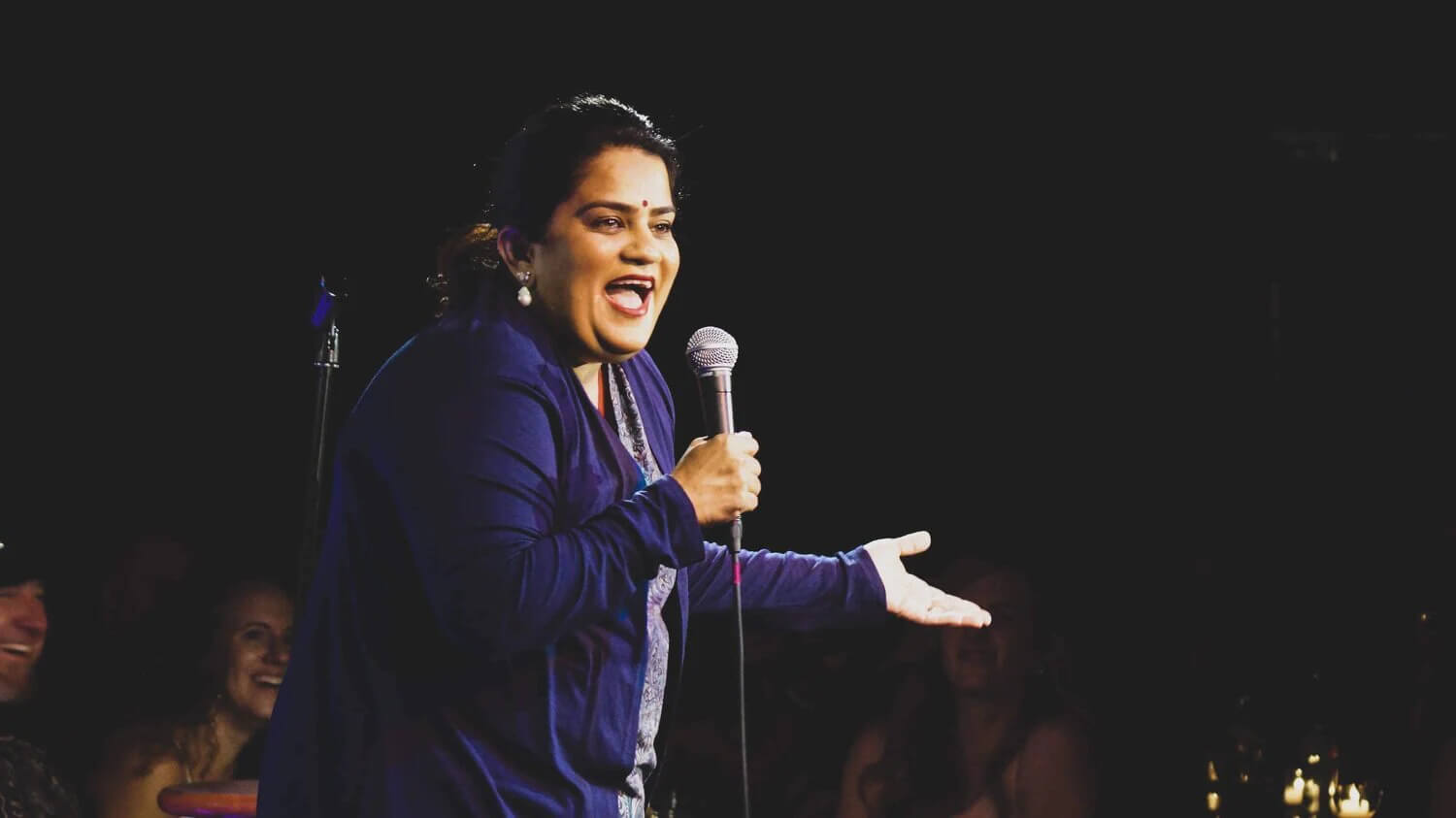 JFL Exclusive: How Comedian Zarna Garg Showed Kevin Hart That Brown Women Can Be Funny Too: Zarna on stage. Photo Credit: www.cnbctv18.com