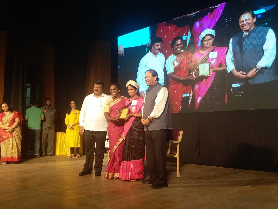 Transgender Akkai Padmashali presening an award at an event